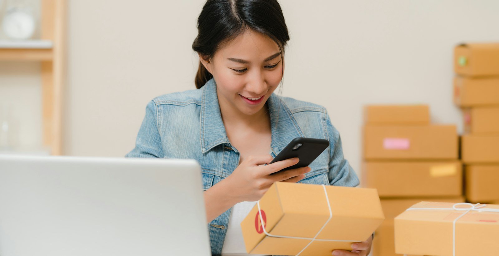 Store owner preparing online orders